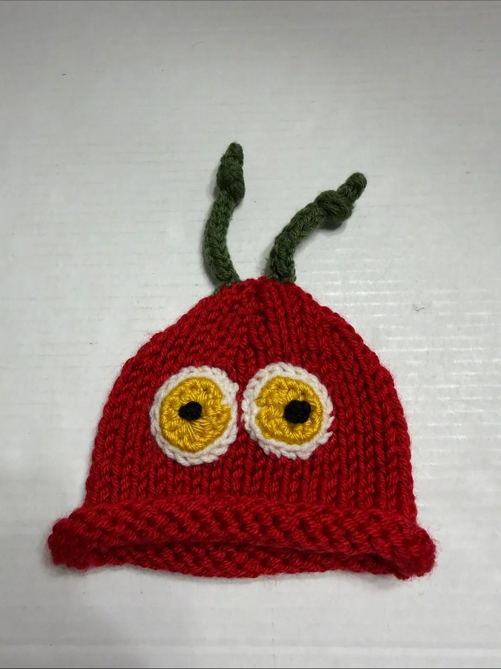 Red Knit Kids Beanie with Yellow Eye Detail and Green Antennae